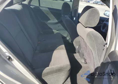 2004 Toyota Corolla Ce z USA, uszkodzony, nr VIN 1NXBR32E44Z283666